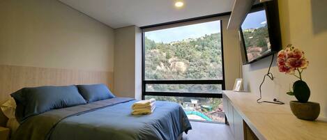 Superior Apartment | Desk, blackout drapes, iron/ironing board, free WiFi