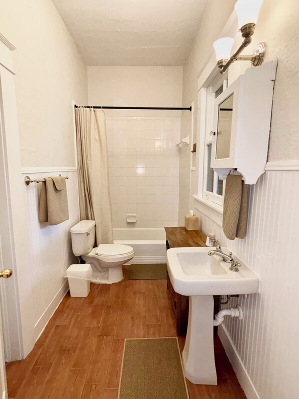 Hair dryer, towels, soap, toilet paper