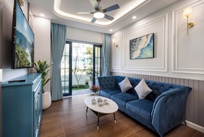 Premier Villa | Living area | 45-inch flat-screen TV with digital channels - Le Gia Villa Nova World Phan Thiet (Phan Thiet)