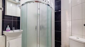 Shower, free toiletries, hair dryer, slippers
