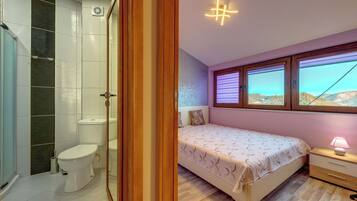 Shower, free toiletries, hair dryer, slippers