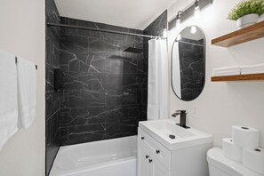 Hair dryer, towels, soap, toilet paper - Cozy Ranch Home with Relaxed Small-Town Feel (Spring Hill)