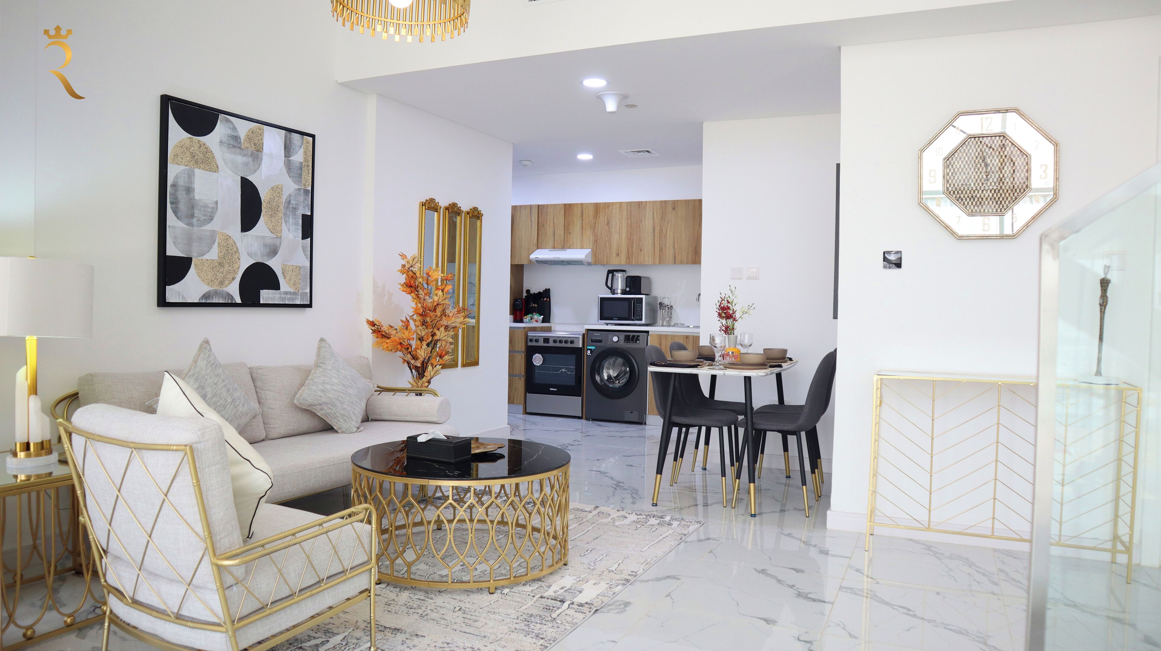 A modern living room with a sofa, coffee table, and decorative elements.