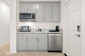 Fridge, microwave, stovetop, coffee/tea maker