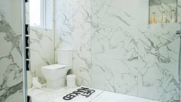 Hair dryer, towels, soap, toilet paper