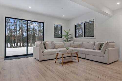 ✨ Scandinavian Lakefront Retreat | Hot Tub • Private Beach • Sleeps 13 ✨<br> Brand New, modern home with high end amenities - close to Ogunquit, Kennebunkport and Wells Beaches.