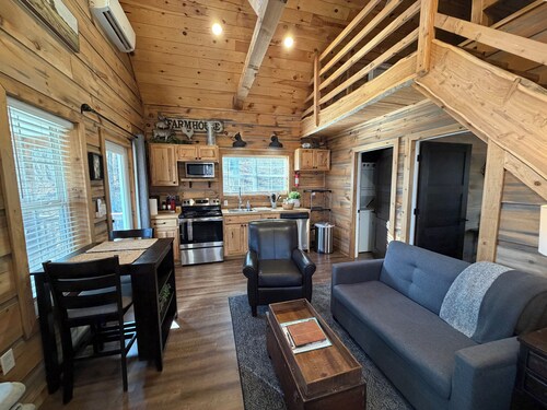 Quaint cottage with 3 queen beds and screened porch.