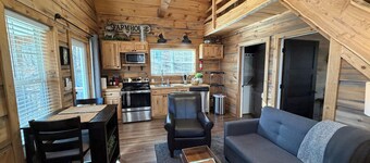 Quaint cottage with 3 queen beds and screened porch.