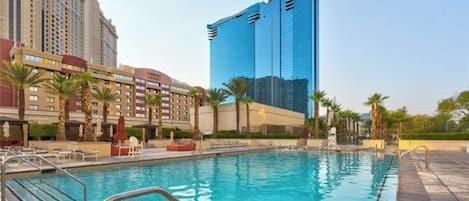 Outdoor pool, open 10:00 AM to 5:00 PM, pool umbrellas, sun loungers