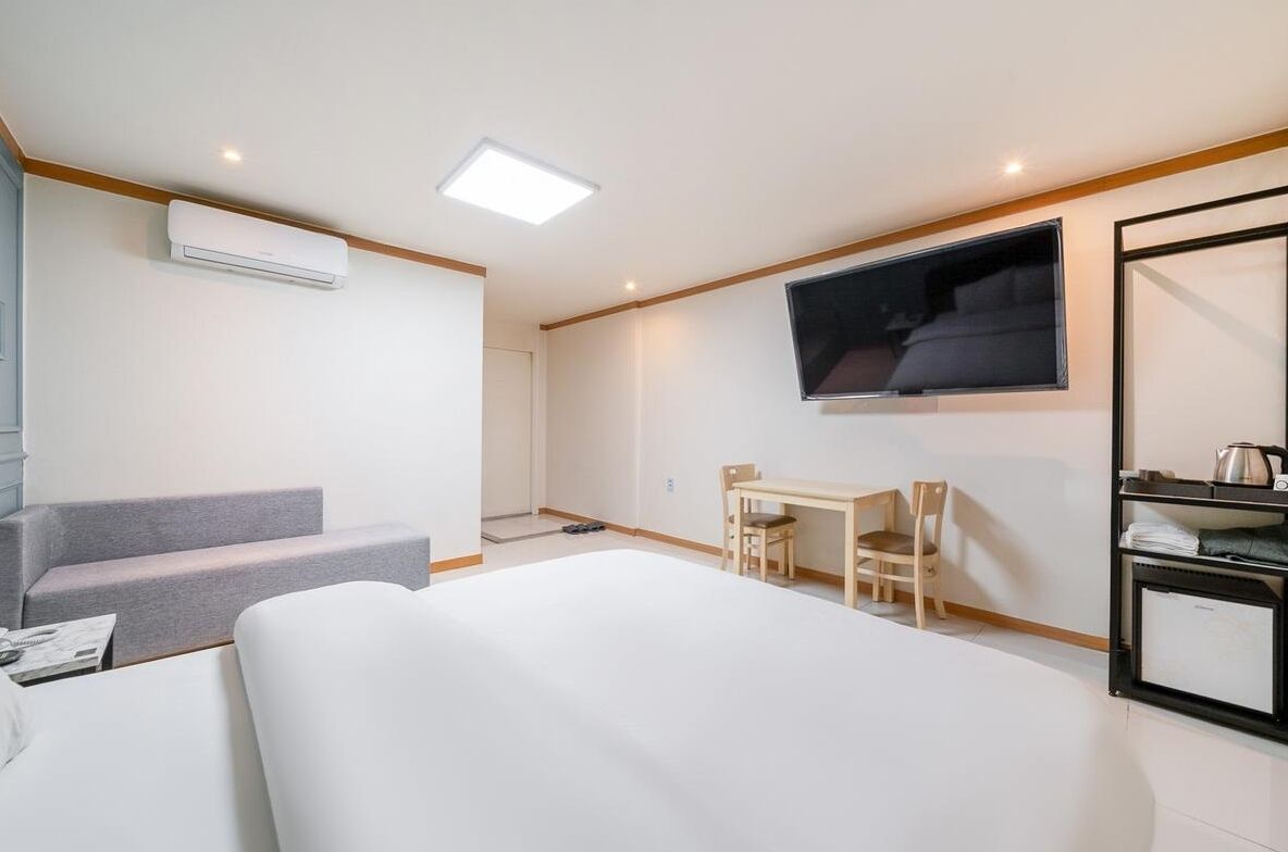 Standard Double Room, City View | Desk, laptop workspace, free WiFi, bed sheets