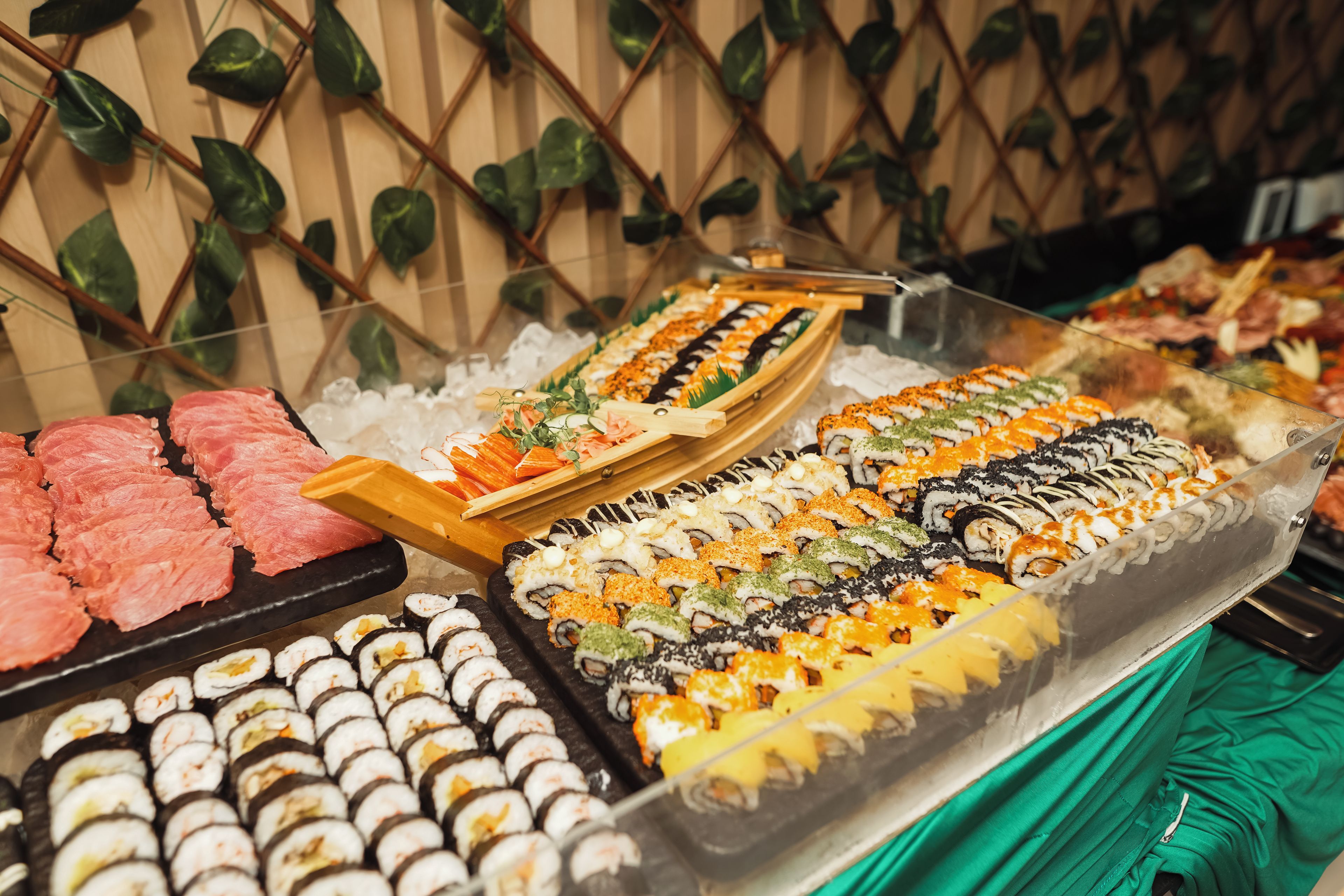 A variety of sushi and sashimi on display.