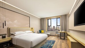 A modern hotel room with a large bed, a desk, a chair, a TV, and a city view. - Days Hotel By Wyndham Changzhi Luzhou (Changzhi)