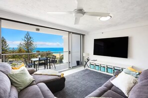 Apartment, 2 Bedrooms, Balcony, Ocean View | Living area | 42-inch Smart TV with digital channels, Netflix, streaming services - Beachfront Bliss in Surfers Paradise (Surfers Paradise)