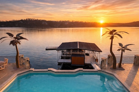 Outdoor pool, a heated pool. Porto Cima - The best in Luxury living at the lake - Arcade, Sleeps 30 PLUS
