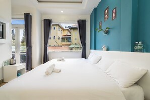 Deluxe Quadruple Room, Balcony | Blackout curtains, free WiFi - Gia Khang Hotel Dalat (Da Lat)