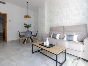 TV - Urban Chic 3A - 1 dorm Living4malaga (Distrito Centro)