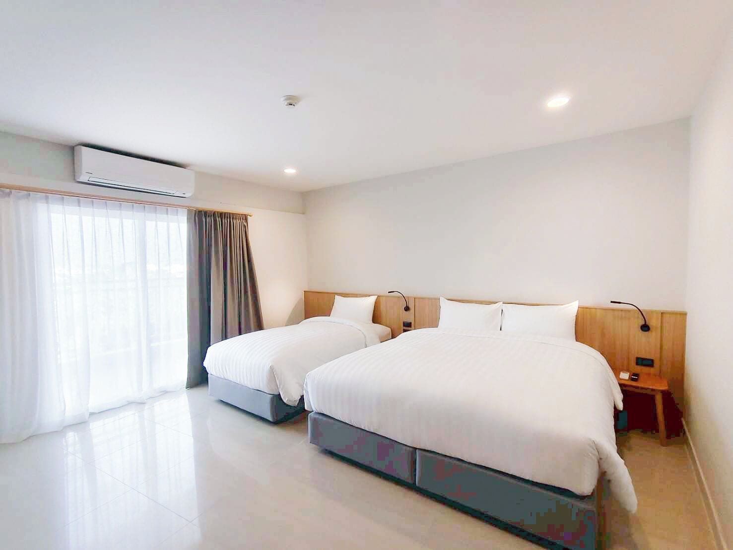 Deluxe Triple Room | Desk, free WiFi