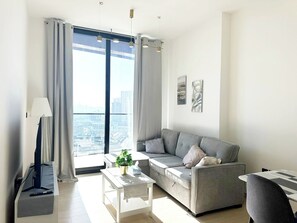Living area - Cozy 1-bedroom apartment in JVC (Dubai)