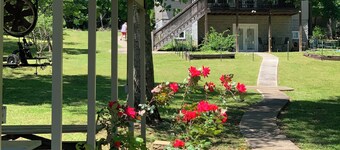 Lake side apartment with shared 100’ pier and pavilion with rock BBQ pit.