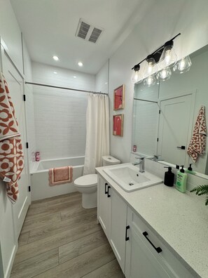 Hair dryer, towels, soap, toilet paper