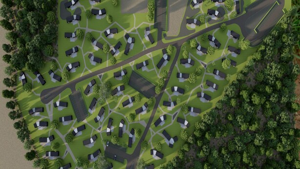 An aerial view of a residential area with multiple houses, roads, and green spaces. - Palette Resort De-steppe Family Stay (Ulicoten)