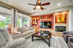 TV, fireplace, books - Backyard Paradise & Community Perks: Buckeye Oasis (Buckeye)
