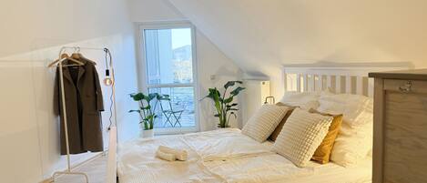 2 habitaciones, cuna de viaje, wifi gratis y ropa de cama