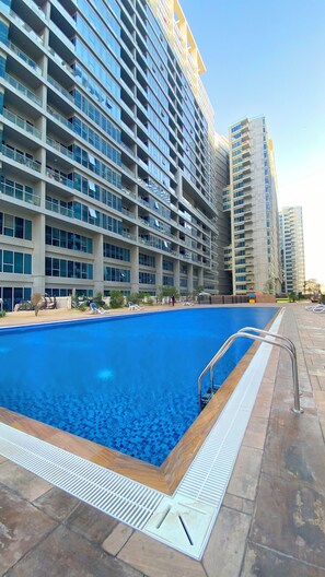 Outdoor pool - SkyCourt Tower By Hostiva (Dubai)