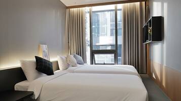 Kamar Twin Keluarga | Tirai kedap cahaya, setrika/meja setrika, dan Wi-Fi gratis