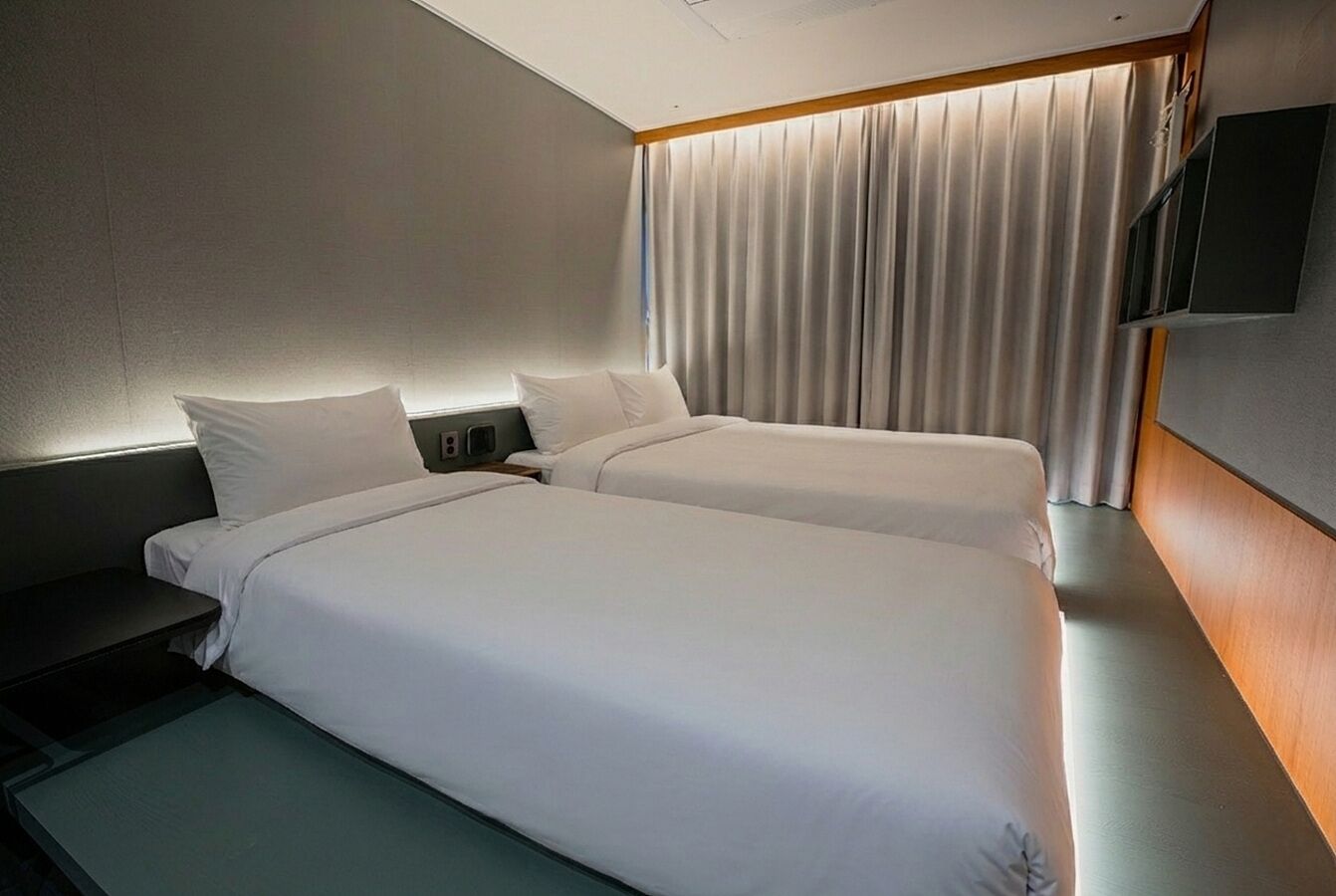 Triple Room | Blackout drapes, iron/ironing board, free WiFi