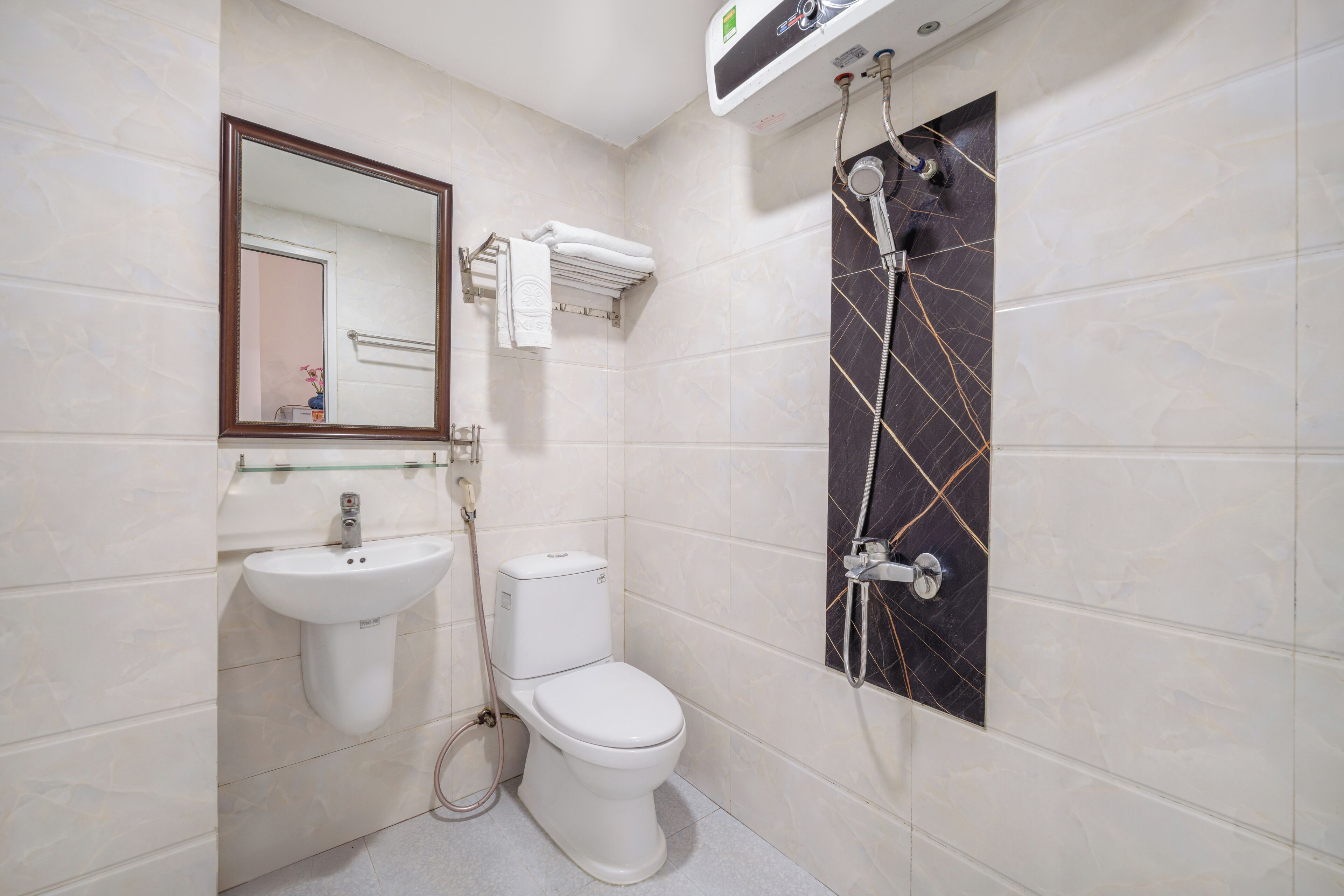 Shower, free toiletries, hair dryer, towels