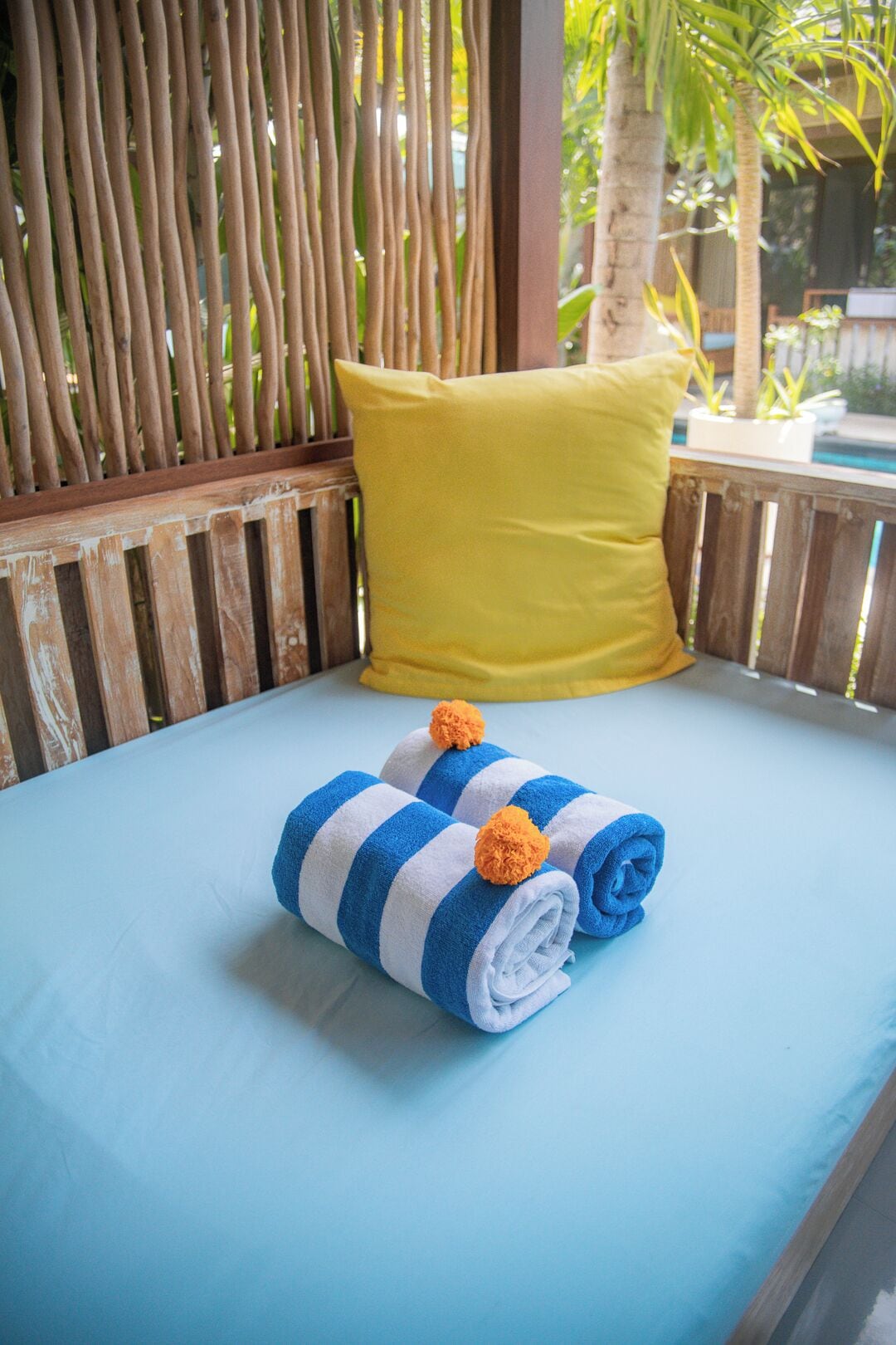 Deluxe Triple Room, 1 King Bed, Non Smoking, Pool View | Living area | Books