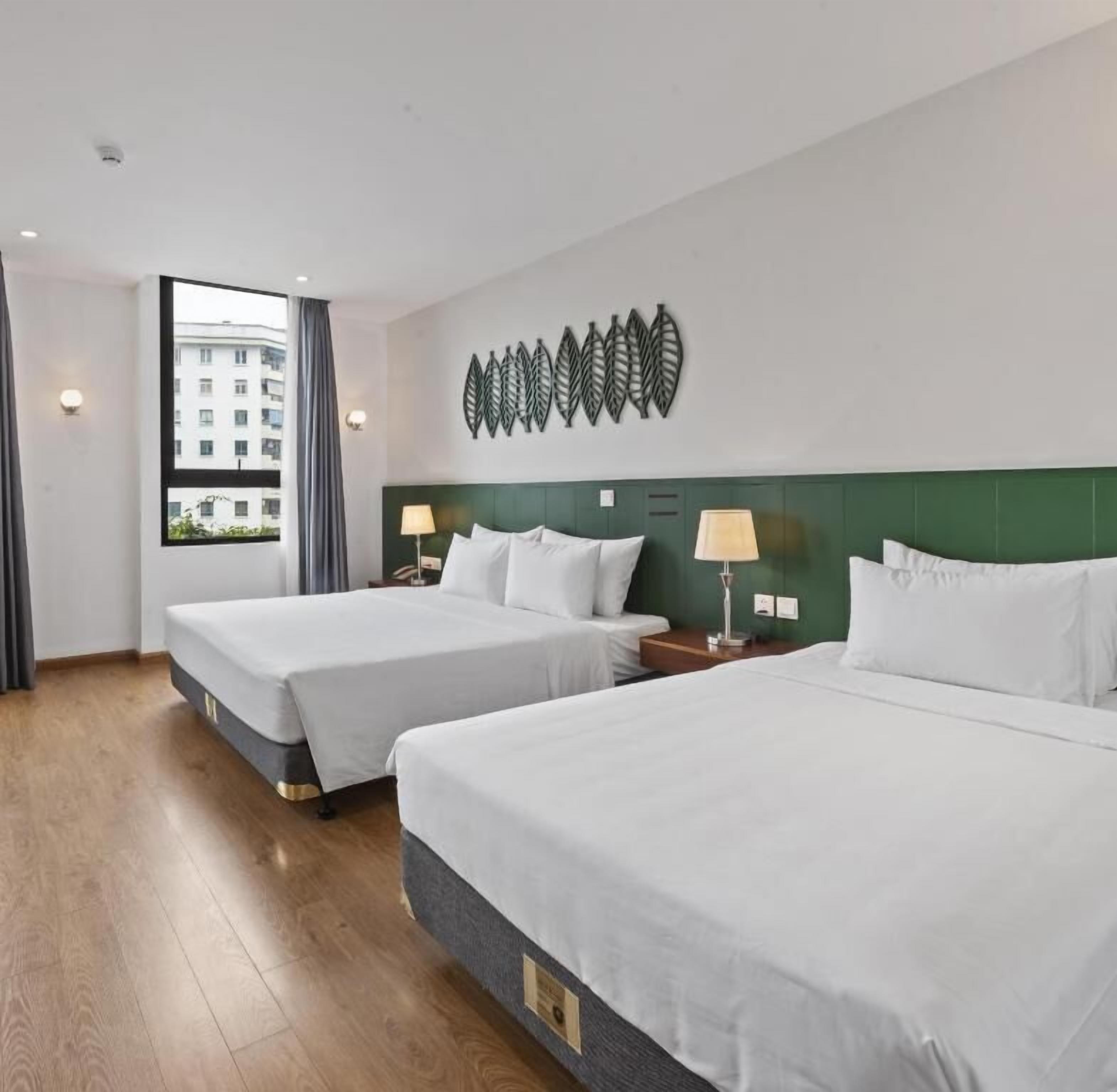 Family Room, City View | Down comforters, in-room safe, desk, soundproofing