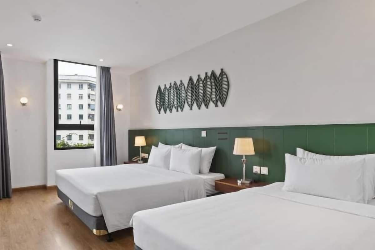 Family Room, City View | Down comforters, in-room safe, desk, soundproofing