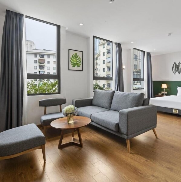 Family Room, City View | Living area - 22Land Classic Suites (Hanoi)