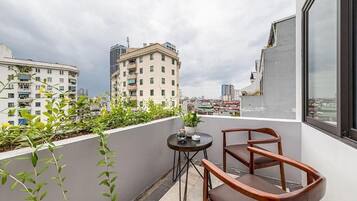 Familieværelse - byudsigt | Udendørs spisemuligheder