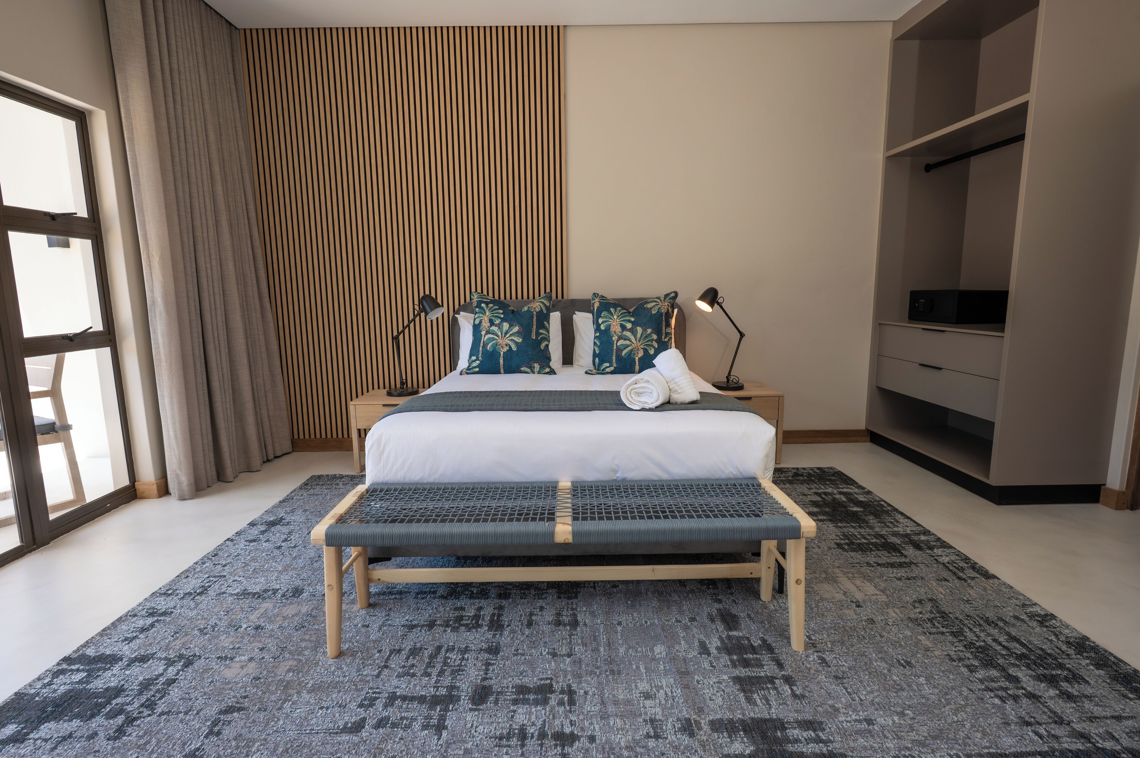 Luxury Studio Suite, Pool View | In-room safe, desk, laptop workspace, blackout drapes