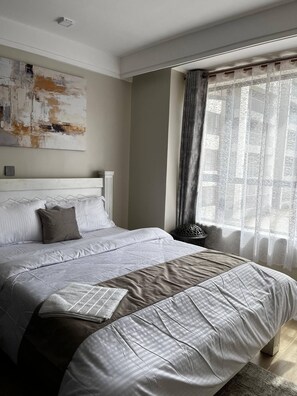 2 chambres, fer et planche à repasser, accès à Internet