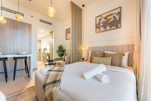 In-room safe, iron/ironing board, free WiFi, bed sheets - Contemporary Studio Apartment with Balcony & Community Views - Azizi Riviera 48, Al Merkadhby Deluxe Holiday Homes (Dubai)
