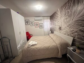2 dormitorios, tabla de planchar con plancha, wifi gratis y ropa de cama