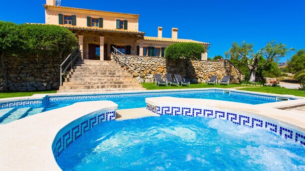 A luxurious villa with a swimming pool, stone steps leading to the entrance, and a well-maintained garden. - Gorgeous home in Arta with private swimming pool, can be inside or outside (Arta)