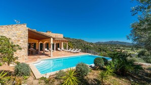 A stone villa with a swimming pool, outdoor seating, and a view of the countryside. - Awesome home in Arta with private swimming pool, can be inside or outside (Arta)