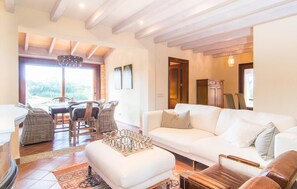 TV, fireplace - Gorgeous home in Cala Ratjada (Cala Ratjada)