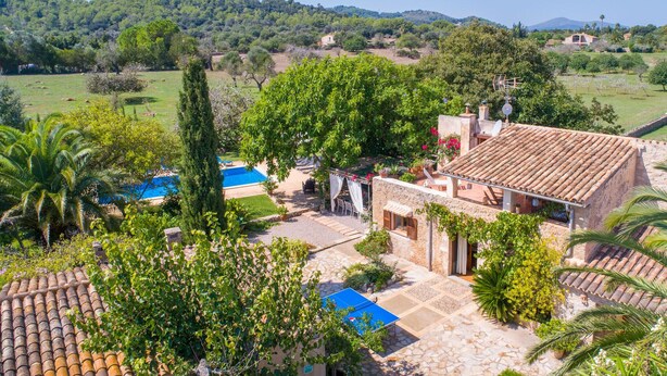 A villa with a swimming pool, outdoor seating, and a stone patio. - Awesome home in Arta with private swimming pool, can be inside or outside (Arta)