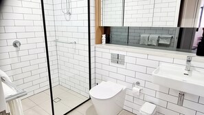 Shower, hair dryer, towels, soap
