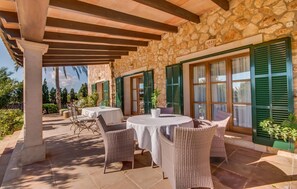 Outdoor dining - Stunning home in Cala dOr with private swimming pool, can be inside or outside (Cala dOr)