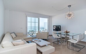 TV - 3 bedroom beach front apartment in Can Picafort (Can Picafort)