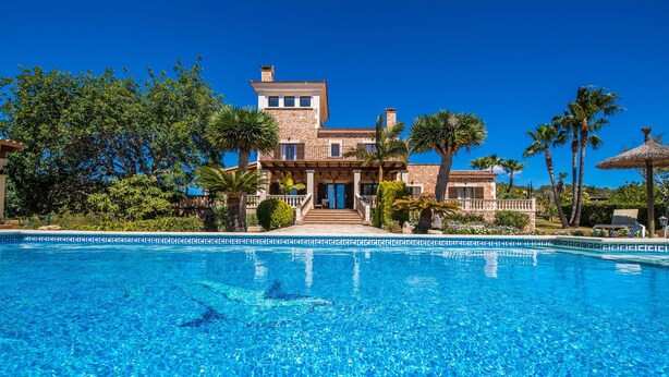 A large, two-story stone building with a swimming pool in the foreground. - Lovely home in SHorta with private swimming pool, can be inside or outside (SHorta)