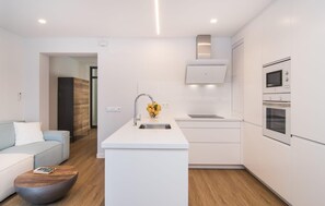 Fridge, microwave, oven, stovetop - 2 bedroom luxurious apartment in SIllot Cala Morlanda (SIllot Cala Morlanda)
