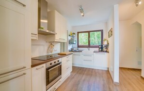 Fridge, microwave, oven, stovetop - Stunning home in Canyamel with private swimming pool, can be inside or outside (Canyamel)